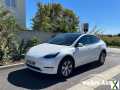 Photo tesla model y Grande autonomie Dual motor