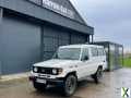 Photo toyota land cruiser HZJ 78 FOURGON 4.2 D TOLE LONG