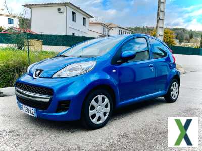 Photo peugeot 107 1.0e 12V 68ch BLUE LION Trendy